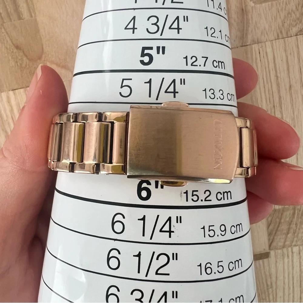 Citizen eco-drive ladies rose gold tone solar dress watch
